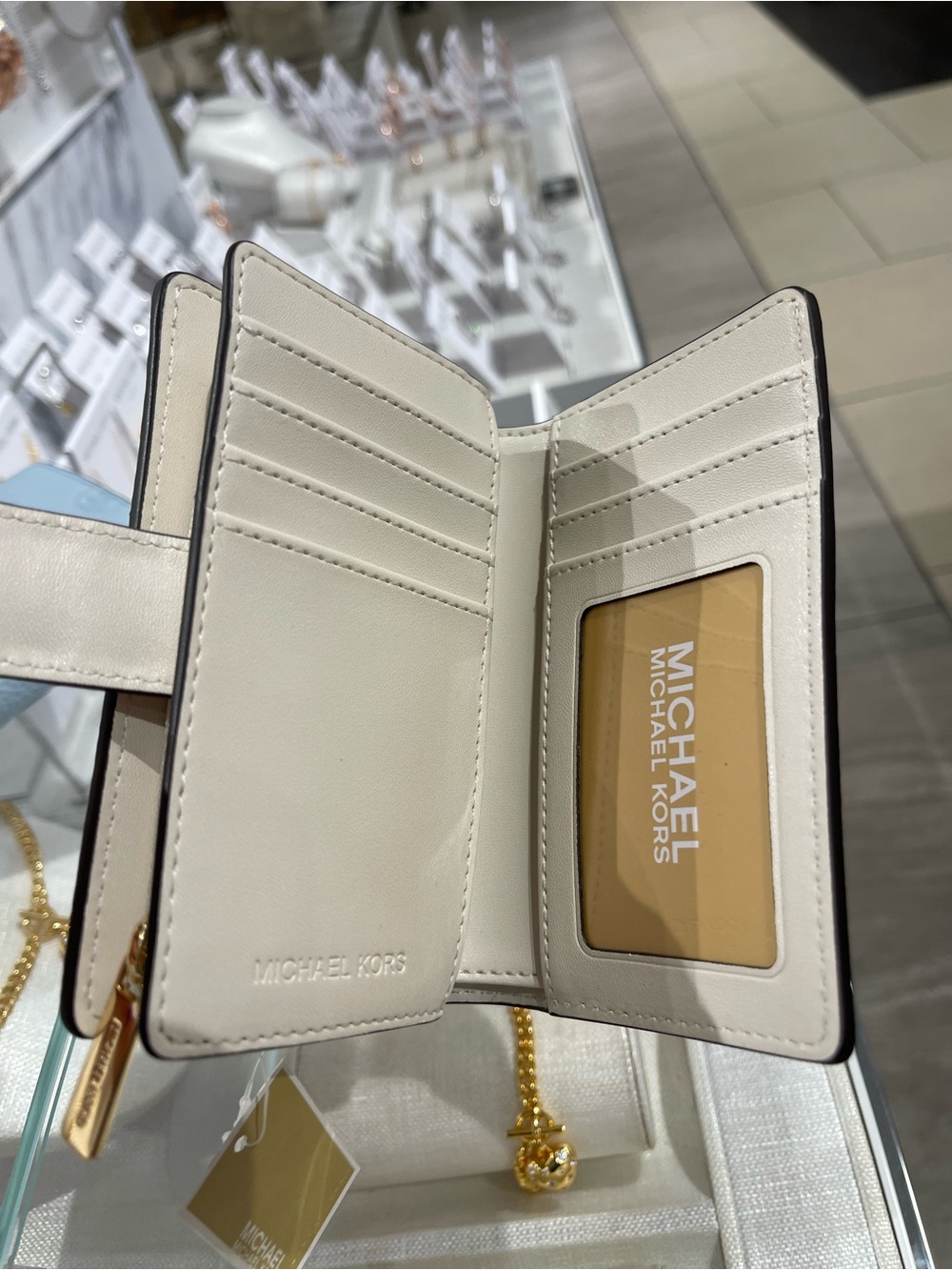 Michael Kors Jet Set Travel Med MK Logo Debossed Bifold Wallet
Light Cream
NWT - Picture 15 of 16